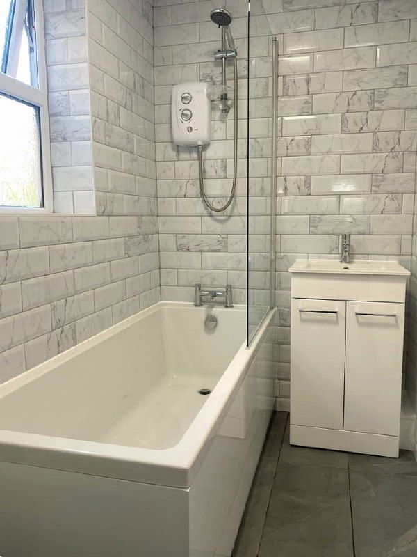 Modern freestanding bath in a Derby bathroom installation